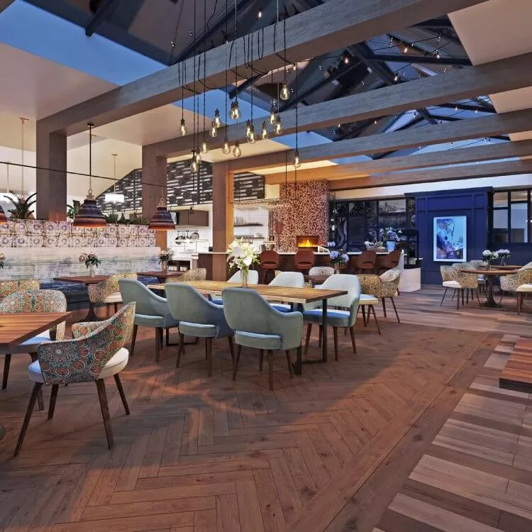 A modern, elegantly designed restaurant interior with contemporary furnishings and an open dining area.