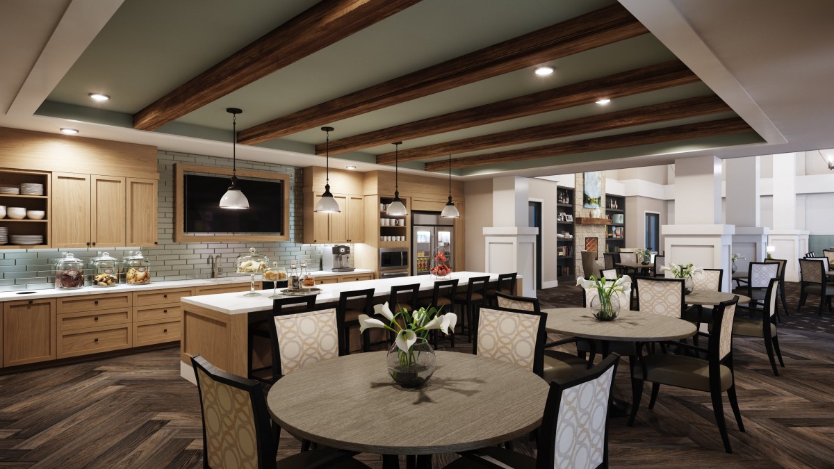 A modern open-concept kitchen and dining area with ceiling beams, pendant lighting, and wooden furniture.