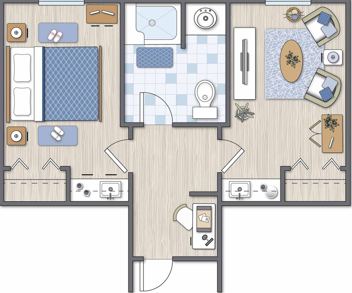 A floor plan of an apartment featuring a bedroom, bathroom, kitchen, and living room.