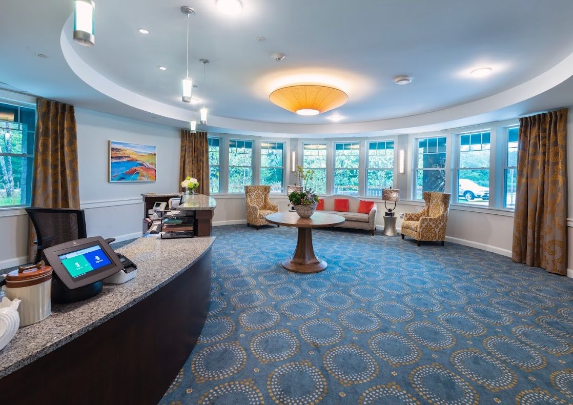 A welcoming lobby area with a reception desk and comfortable seating.