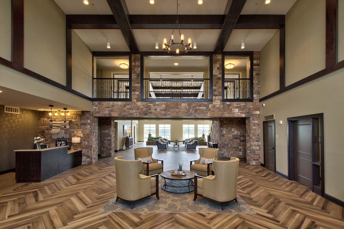 A modern lobby with a cozy seating area and elegant decor.
