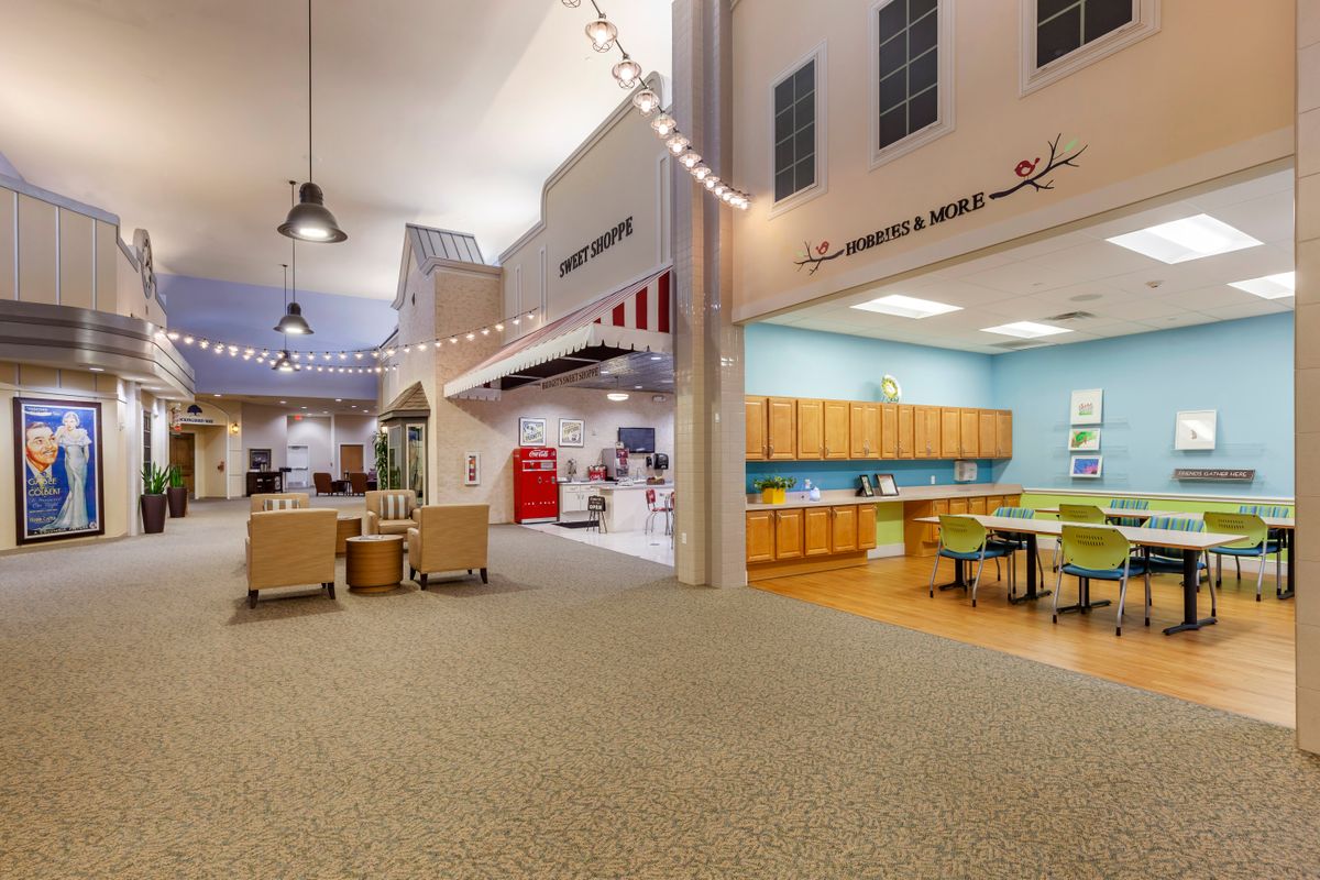 A well-decorated indoor children's area with colorful furniture and playful decor.