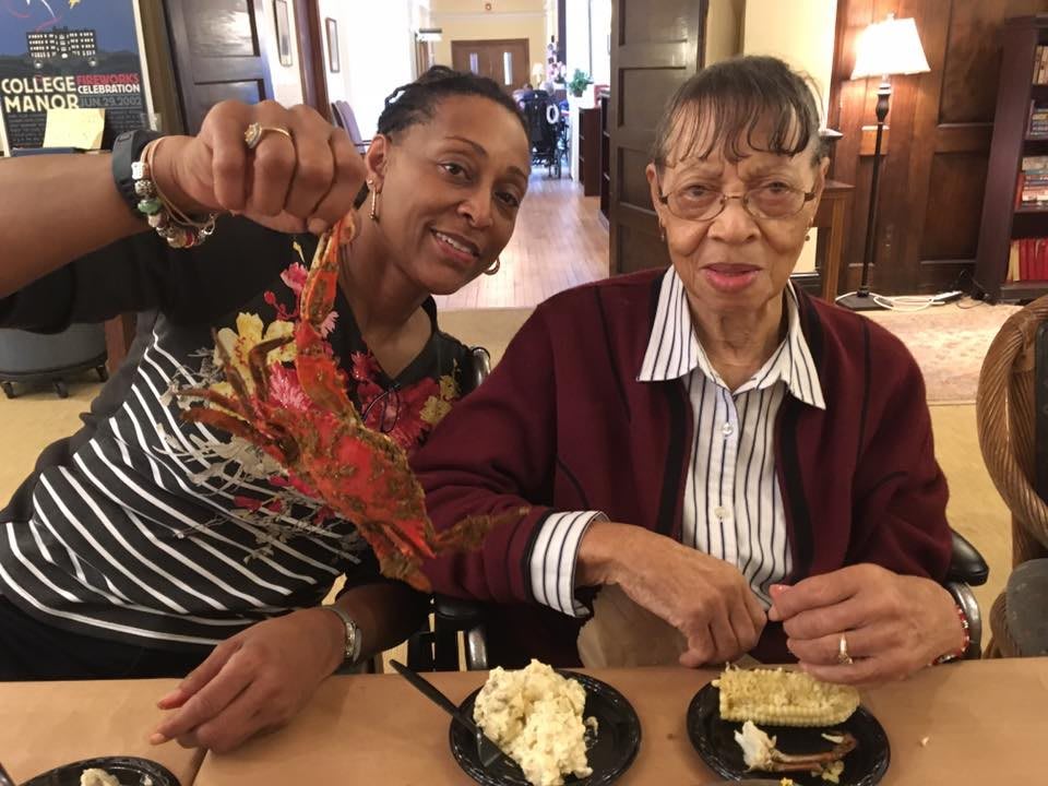 Two people enjoying a meal together indoors.