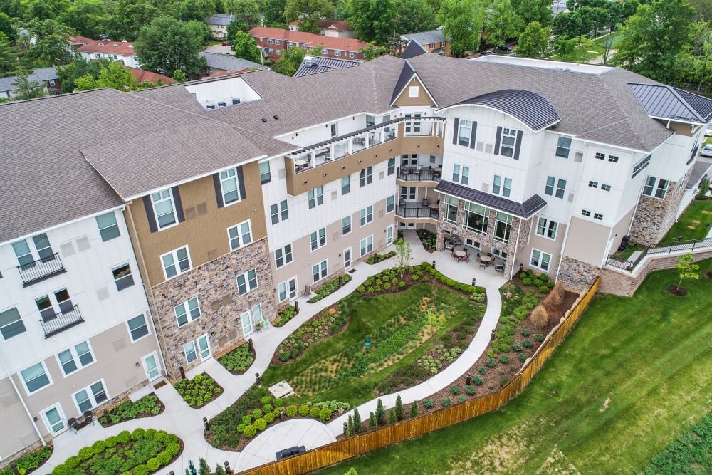 Aerial view of a residential building with a landscaped garden.