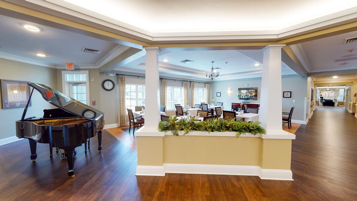 A spacious and elegantly designed living and dining area with modern amenities.