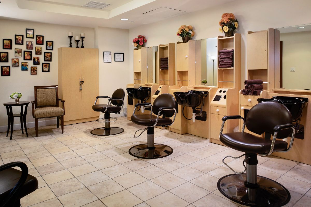 A clean and inviting beauty salon interior with hairdressing stations.