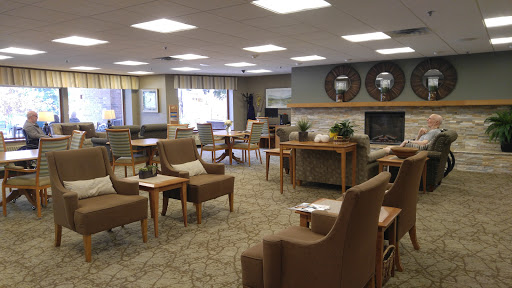 A cozy and inviting lounge area with comfortable seating and a warm ambiance.