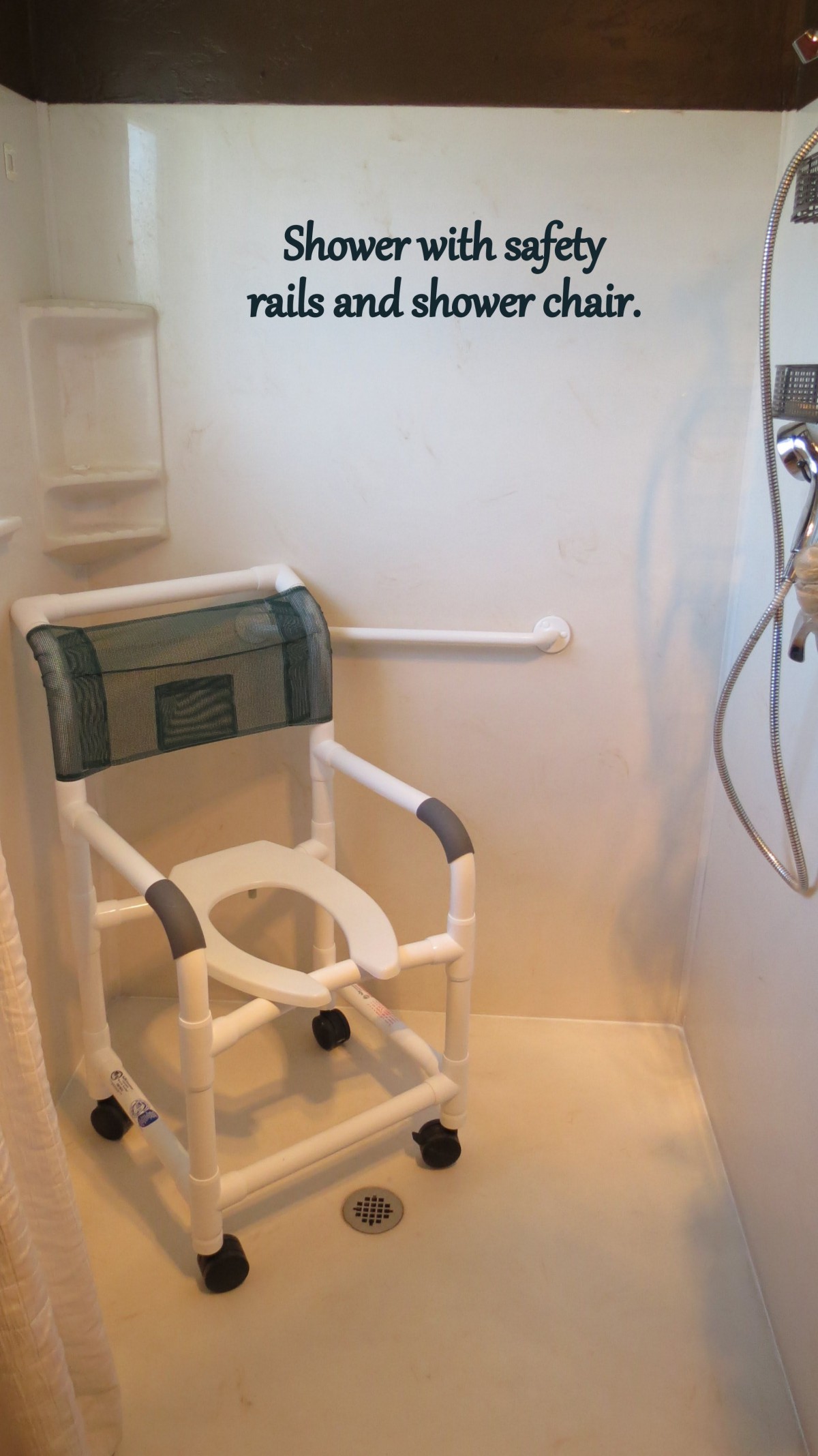 A bathroom with a shower area equipped with a shower chair and grab bar for accessibility.