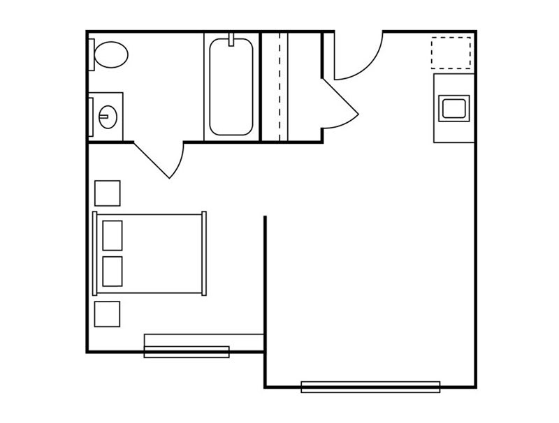 A simple floor plan of a studio apartment with a bathroom and kitchen area.