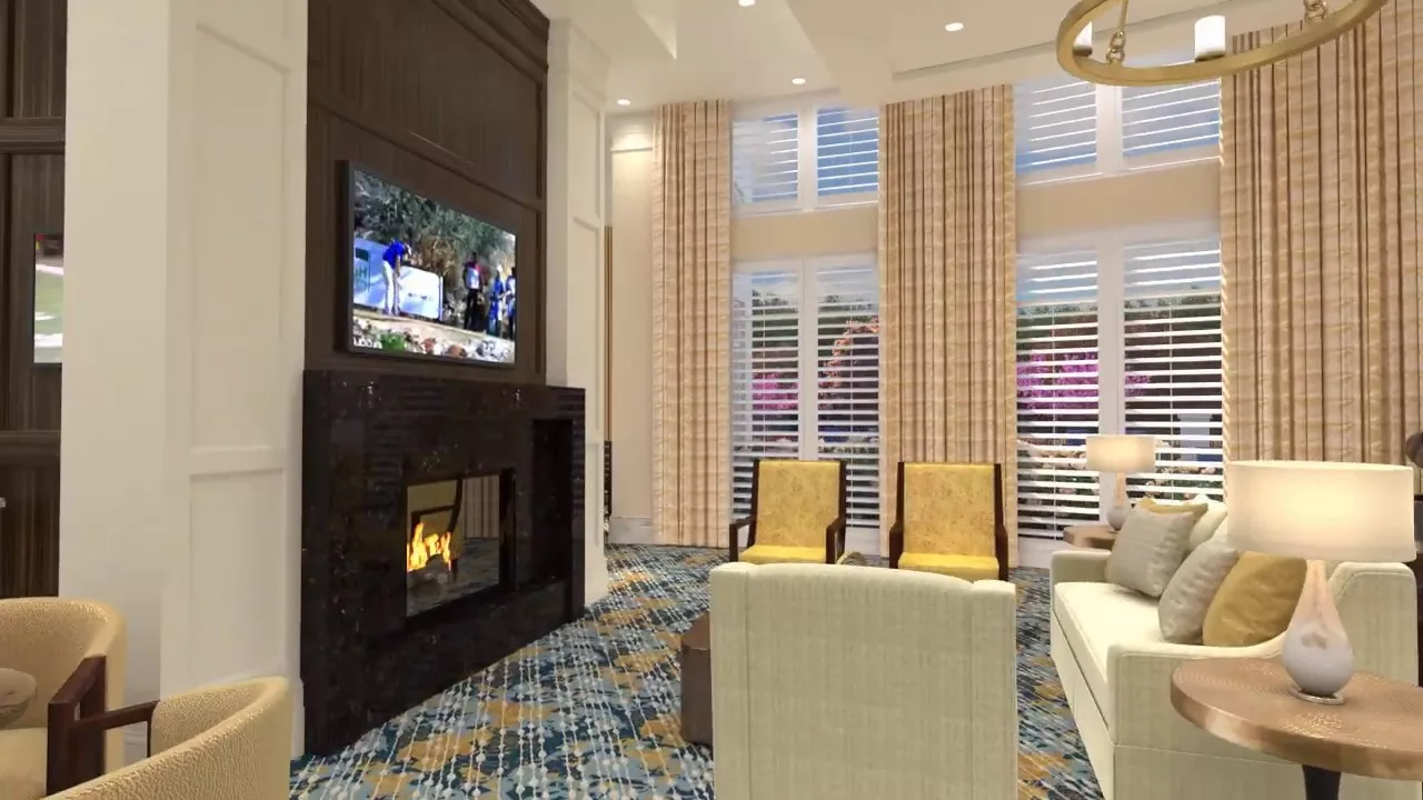 A cozy living room featuring a fireplace and a television, with stylish furniture and decor.