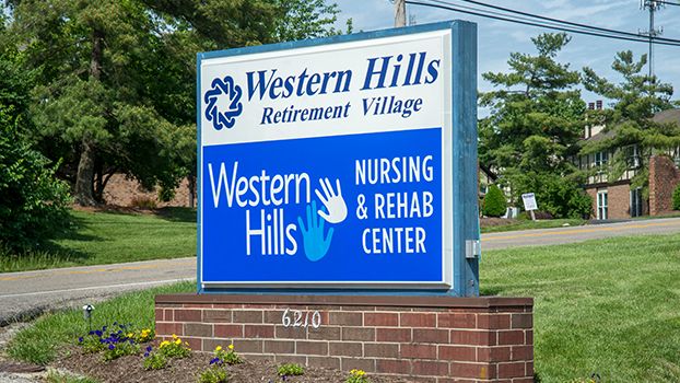 Sign for Western Hills Retirement Village and Nursing & Rehab Center.
