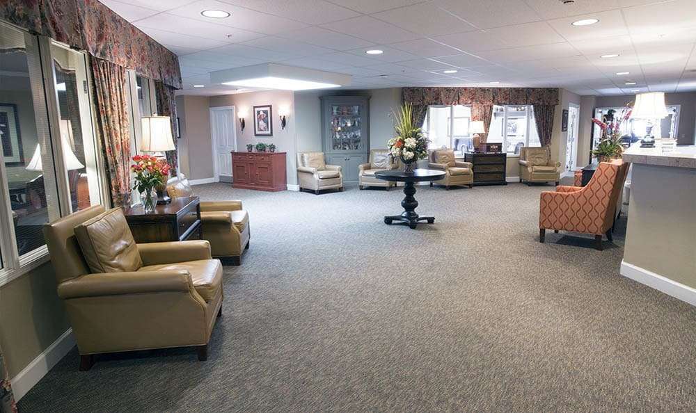 A warmly decorated lobby with comfortable seating and elegant decor.