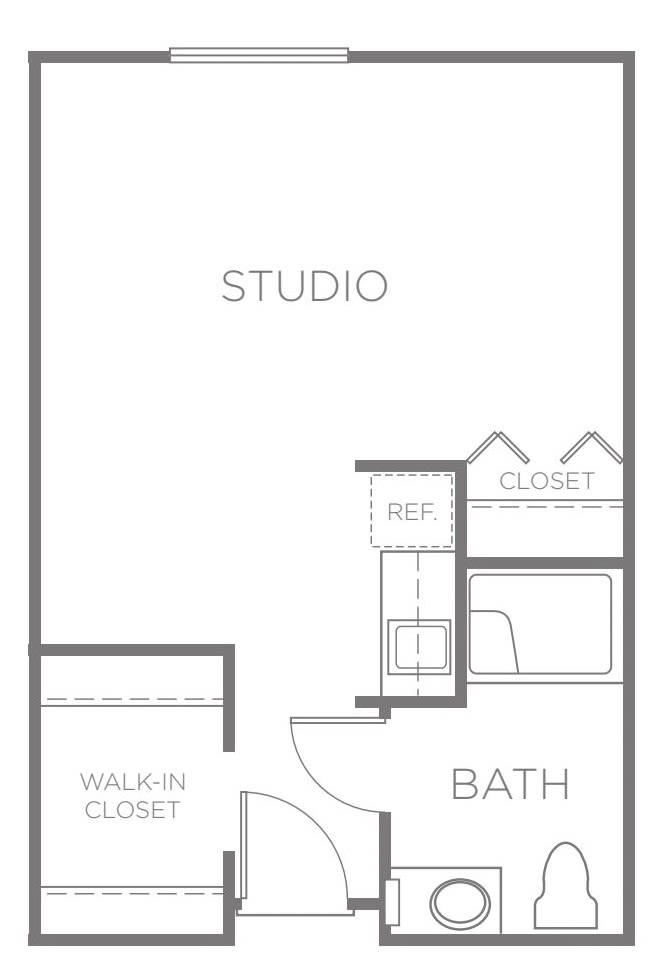 Floor plan of a studio apartment with a walk-in closet and bathroom.