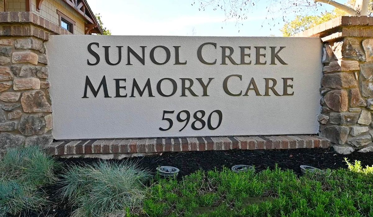 A sign for Sunol Creek Memory Care with the address number 5980.