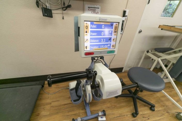 A physiotherapy exercise machine used for rehabilitation purposes in a medical facility.