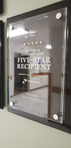 A five-star recipient award plaque recognizing excellence in service.