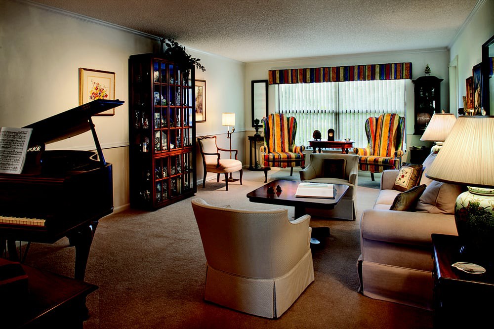 A cozy living room with modern furnishings and ample natural light.