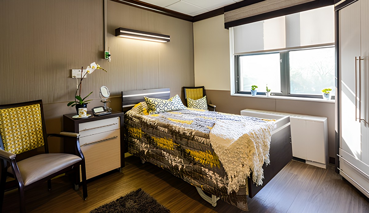 A modern, cozy bedroom with stylish decor and furnishings.