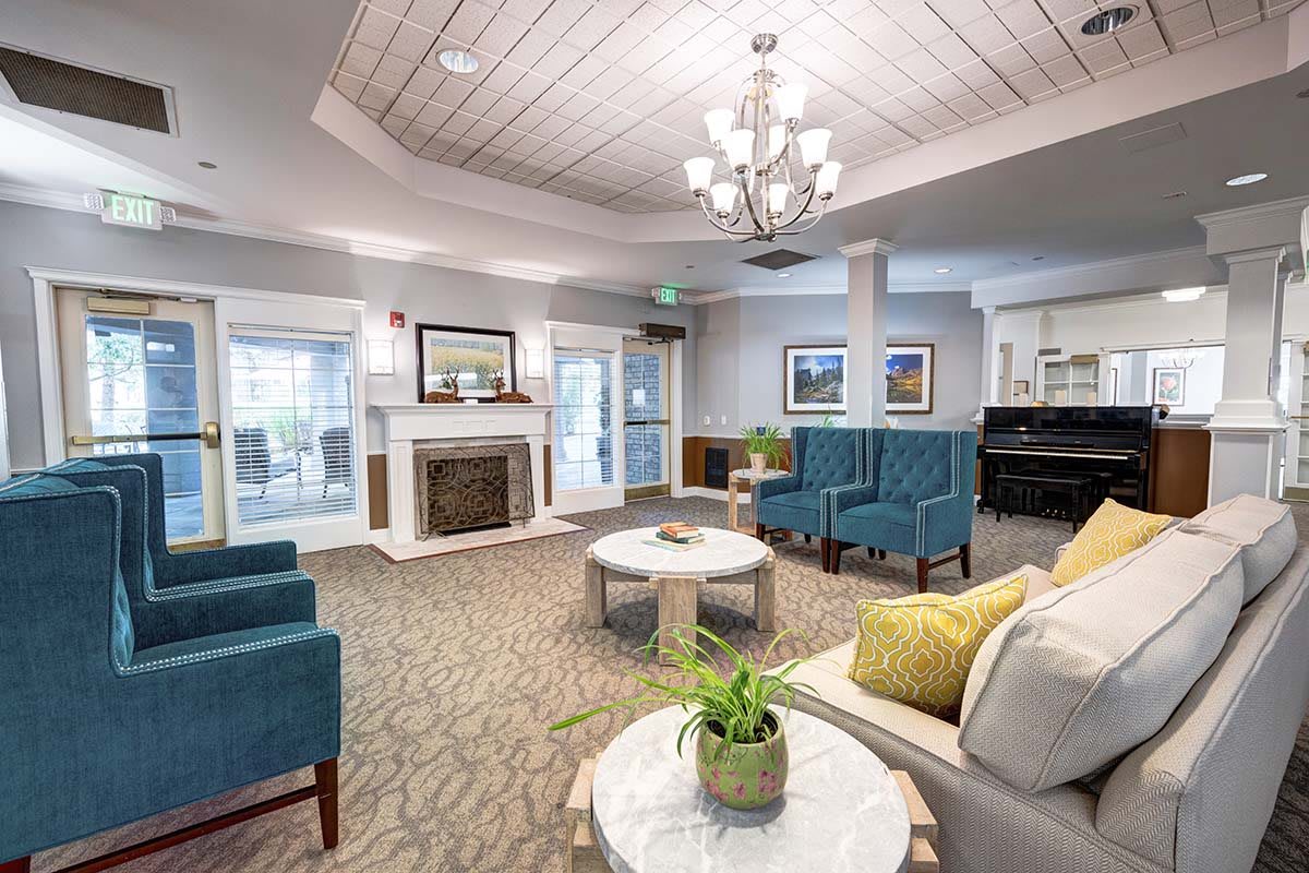 A modern living room with elegant furnishings and a cozy atmosphere.