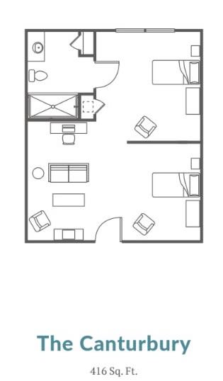 A simple floor plan showing furniture arrangement in an apartment.
