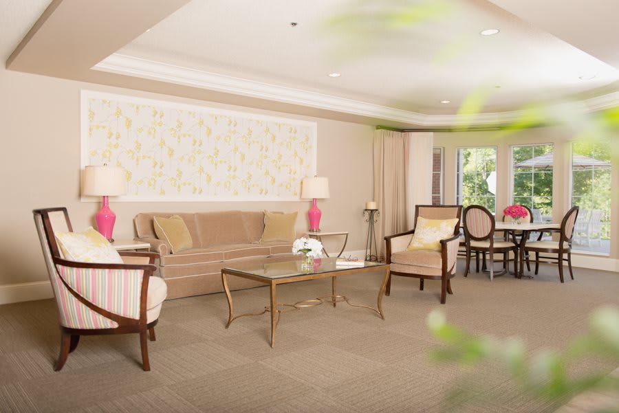 A cozy and elegantly designed living room with comfortable seating and stylish decor.