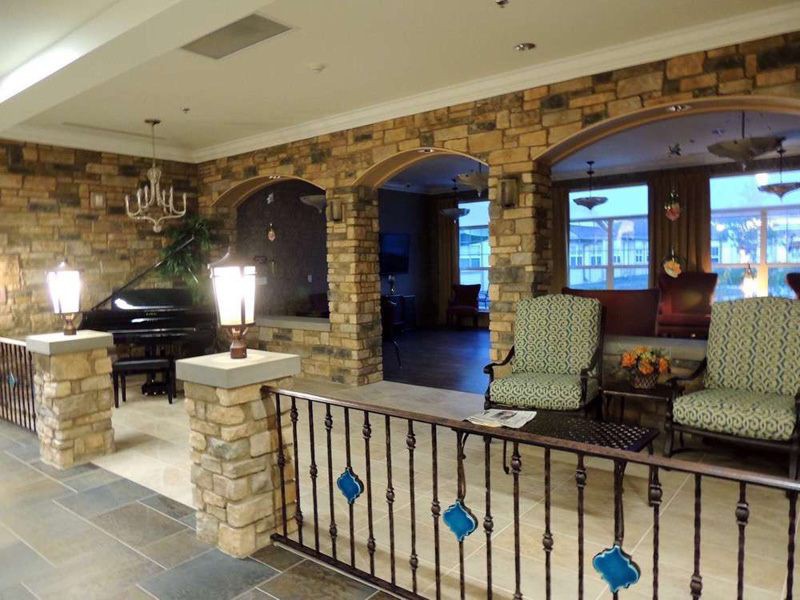 Cozy interior with brick walls and a comfortable seating area.