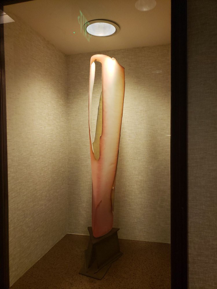 Abstract sculpture in an indoor setting.