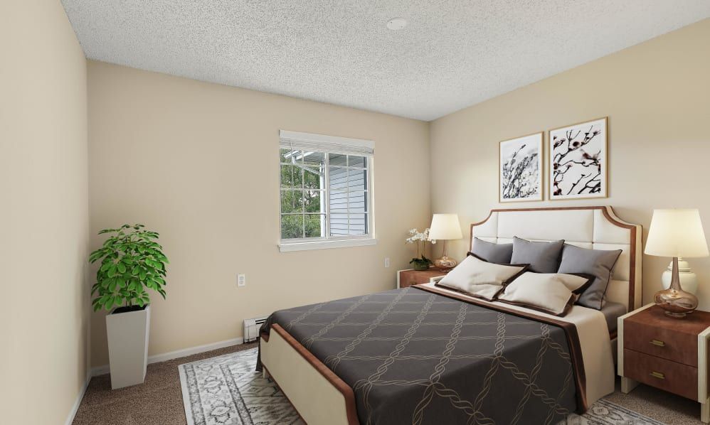 A cozy bedroom featuring a neatly made bed, a bedside lamp, artwork on the walls, and a potted plant beside the window.