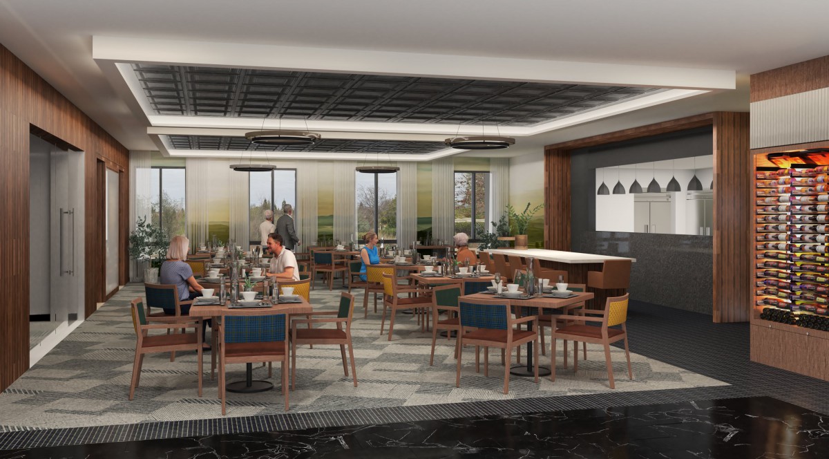 A modern restaurant interior with neatly arranged tables and chairs.