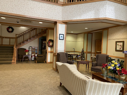 A cozy and inviting lobby space with comfortable seating and seasonal decor.