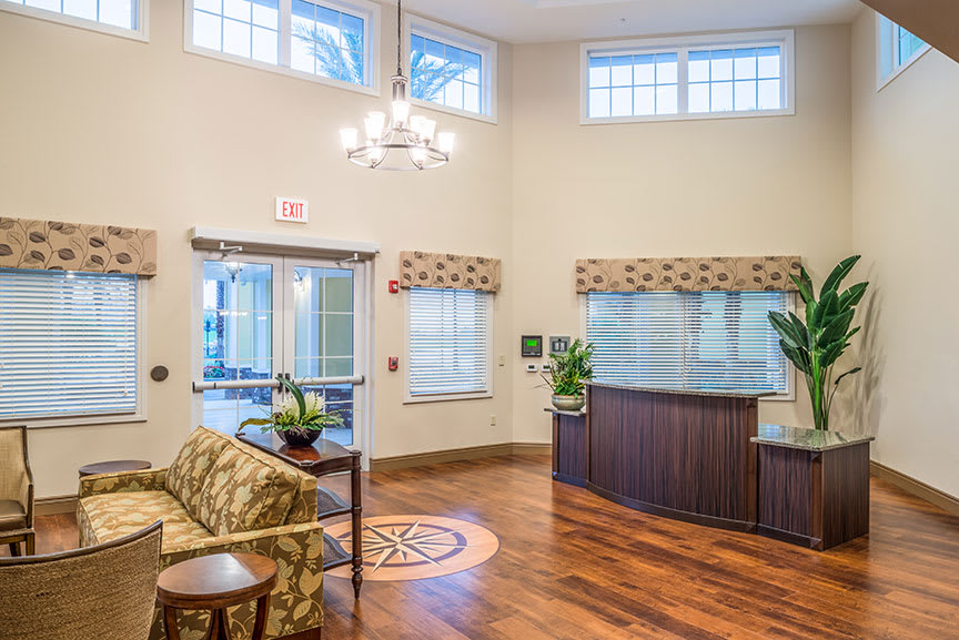 A spacious reception area with comfortable seating and elegant decor.