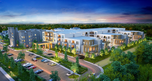 A modern residential complex showcasing elegant design and lush landscaping under a serene evening sky.