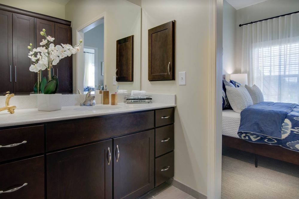 Modern bathroom with a sleek vanity and elegant decor.
