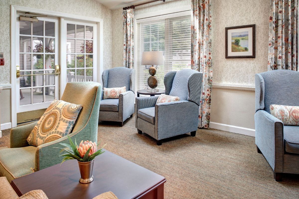 A cozy living room with comfortable armchairs and elegant decor.