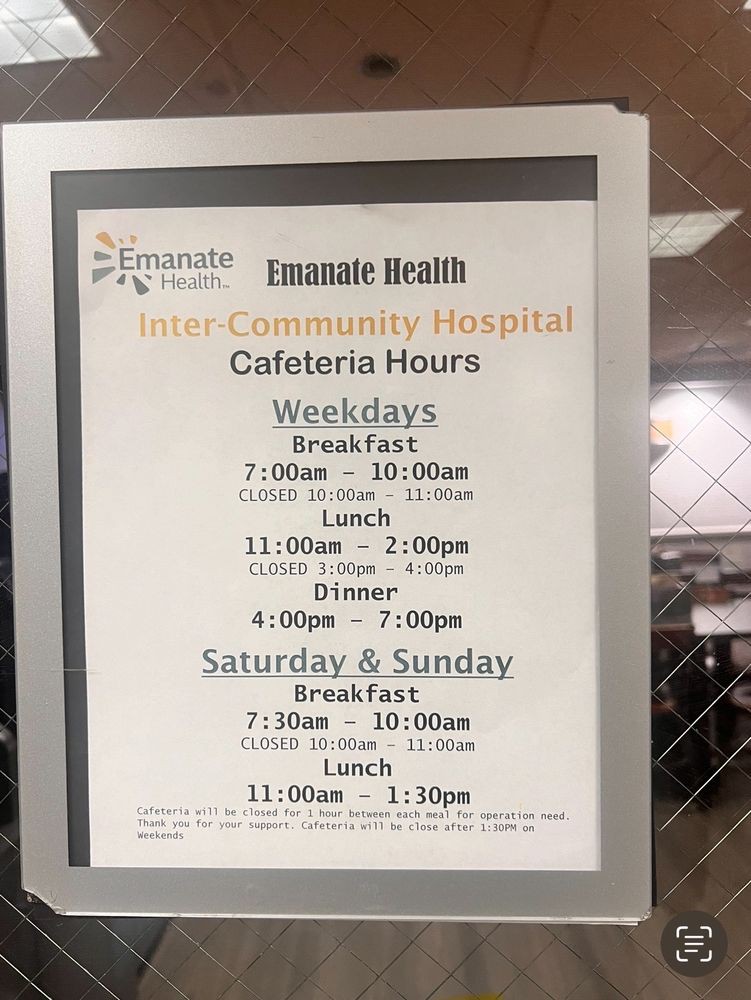 Sign displaying the cafeteria hours at a hospital.