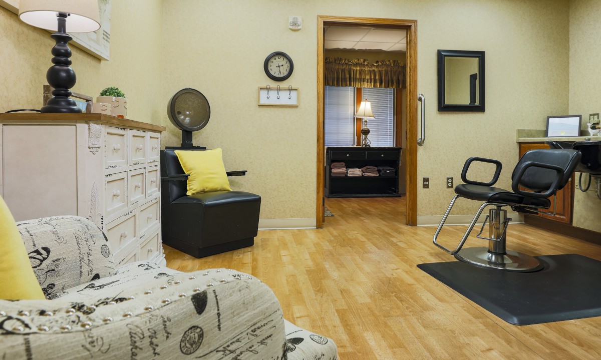 Cozy waiting area with stylish decor and comfortable seating.