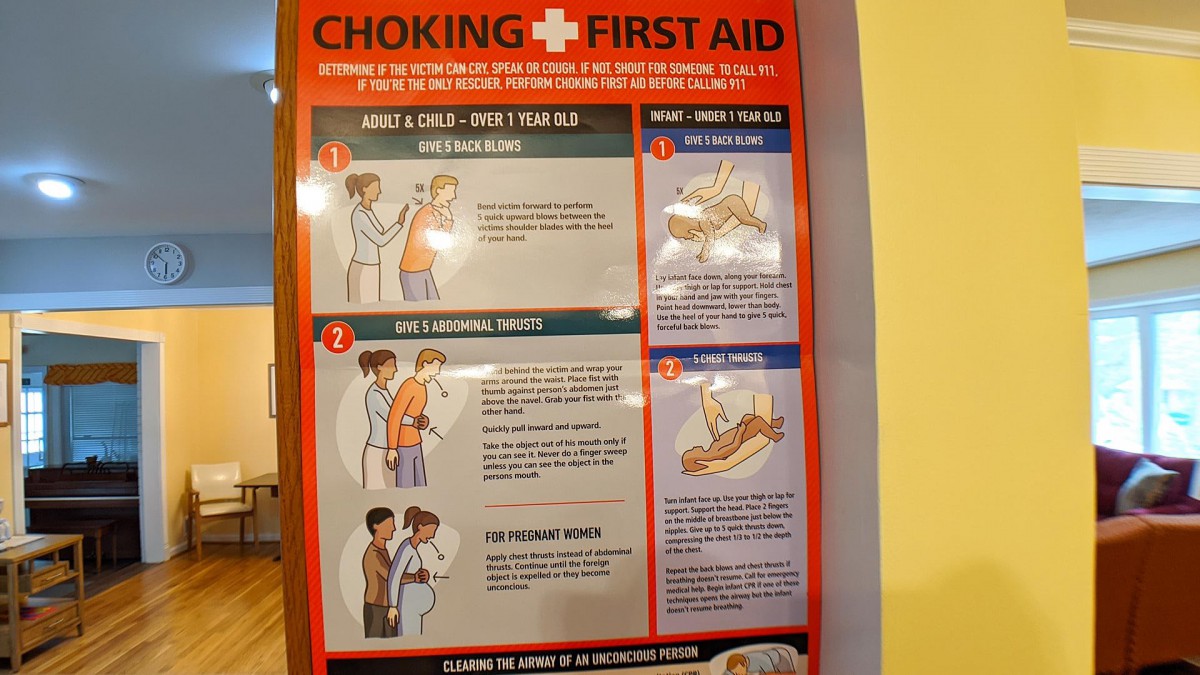 A first aid poster detailing steps to help someone choking, including the Heimlich maneuver and what to do if the person is unconscious.