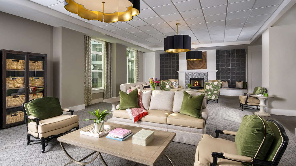 A modern and luxurious living room with elegant furniture and decor.