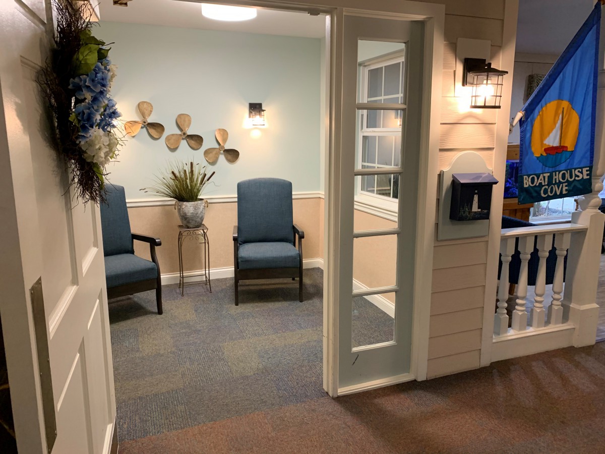 A cozy waiting area with modern decor and comfortable seating.