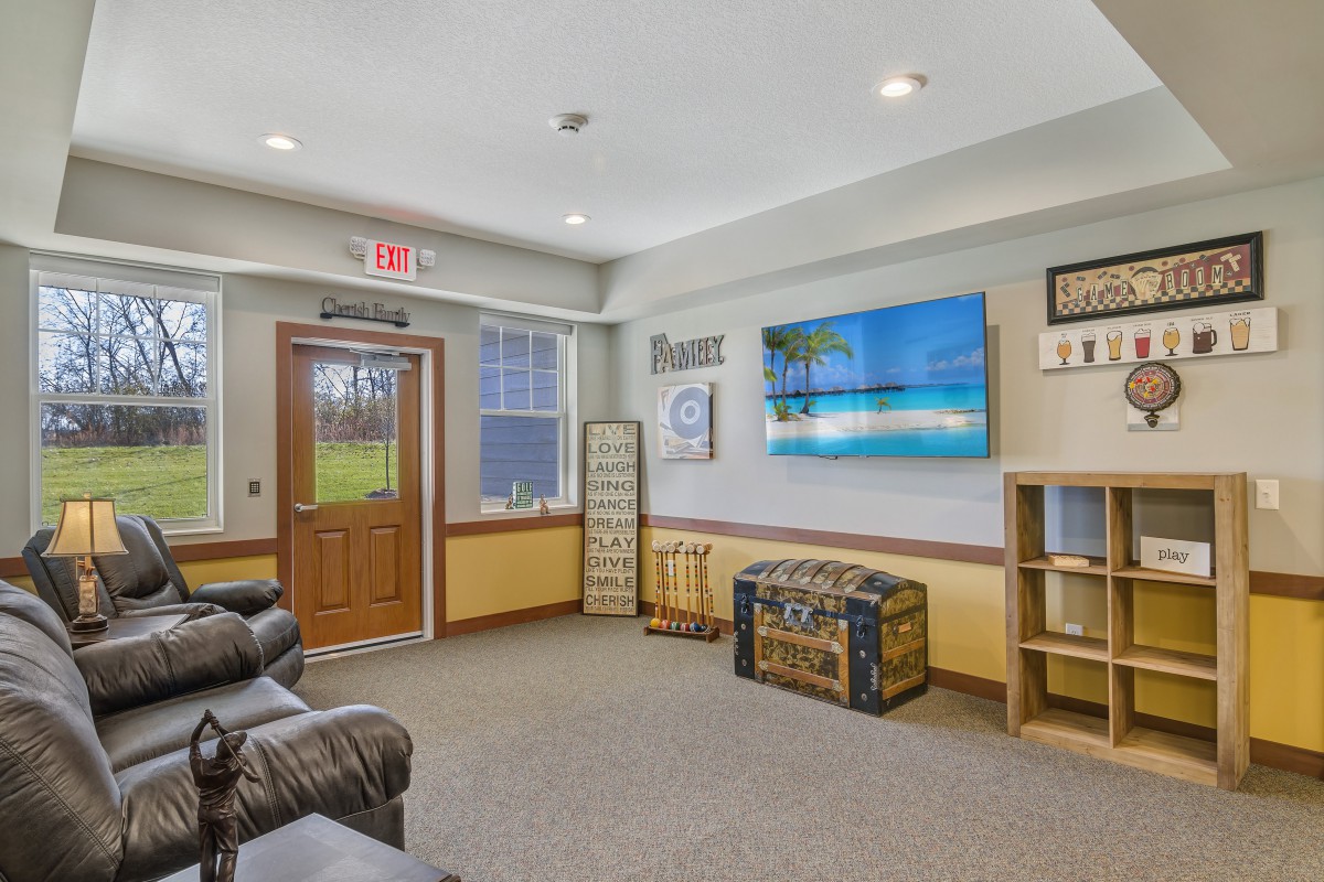 A cozy waiting room with comfortable seating and calming decor.