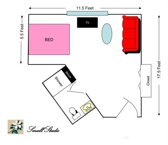 Floor plan of a small studio apartment with designated areas for bed, kitchen, and living space.