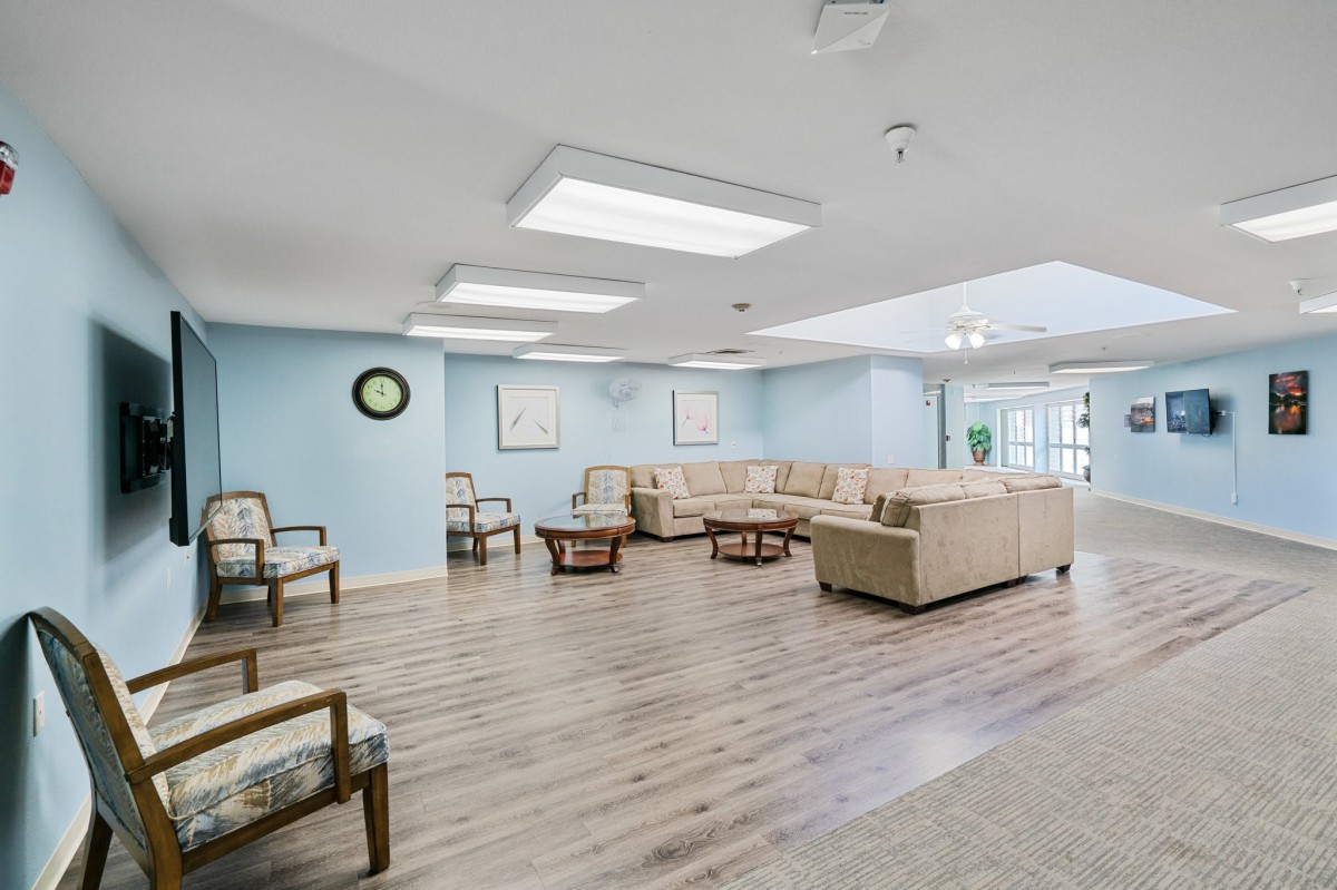 A modern and spacious waiting room with comfortable seating and natural light.