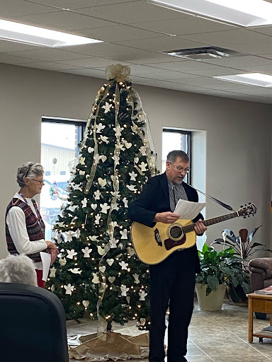 A festive holiday performance with music and companionship, celebrating the spirit of Christmas.
