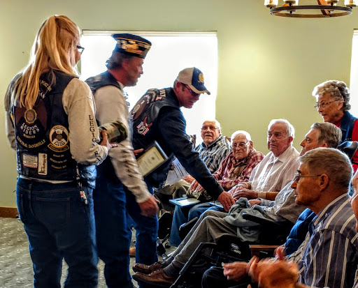 A heartfelt ceremony honoring veterans, bringing together community members and residents to show appreciation.