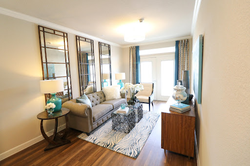 A stylish living room featuring modern furnishings and a vibrant decor.