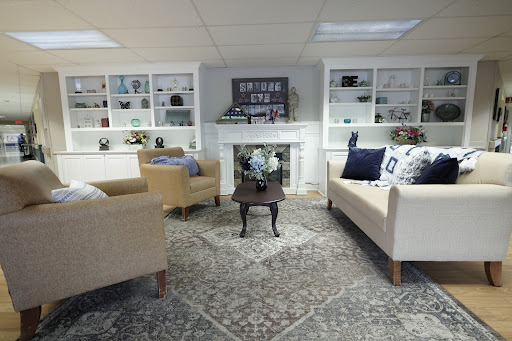 A cozy and modern living room setup with neutral-toned sofas and stylish decor.
