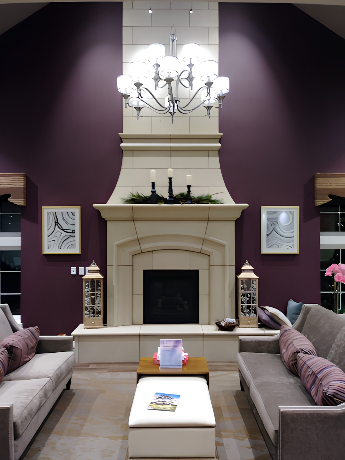 A stylish living room with a central fireplace and elegant decor.