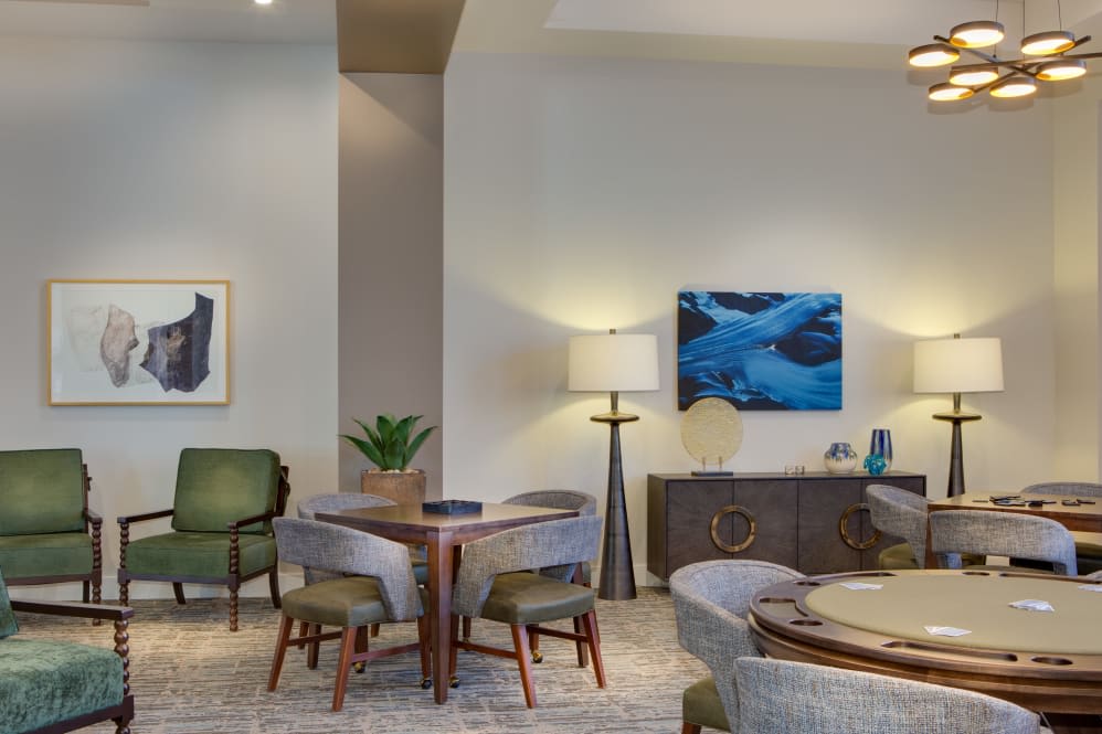 A modern living room with stylish furniture and artwork.