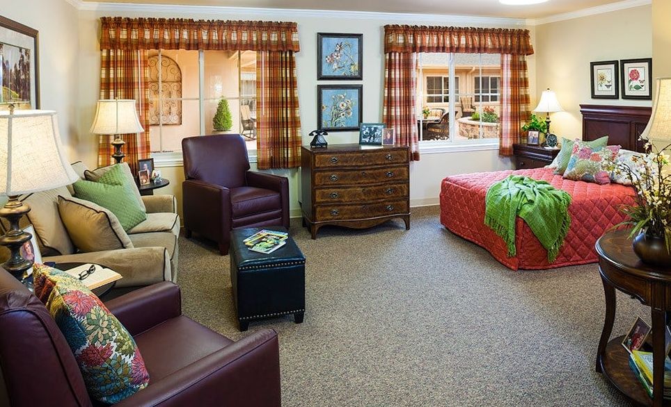 A cozy and well-decorated living space with comfortable seating and natural light.