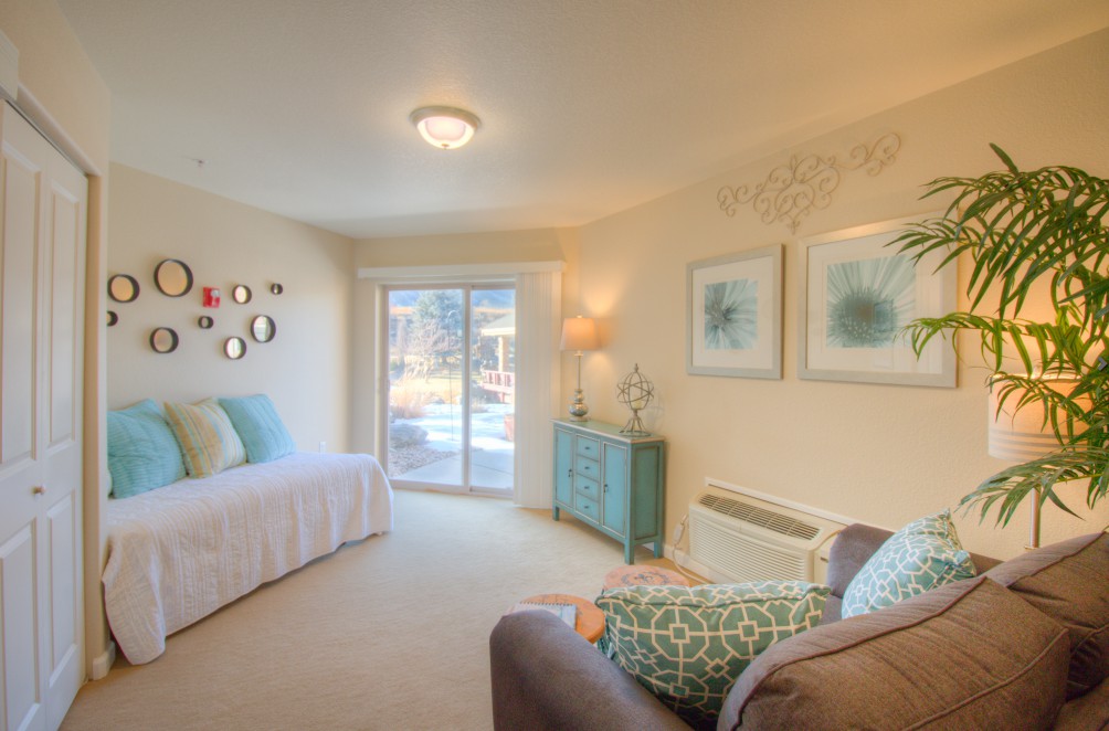 A bright and cozy living room with modern decor and comfortable furniture.
